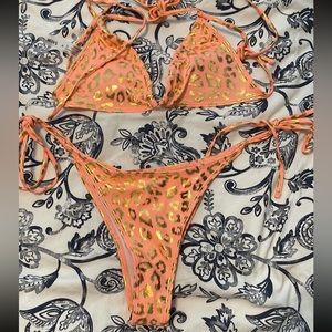 Size medium bathing suit, never worn